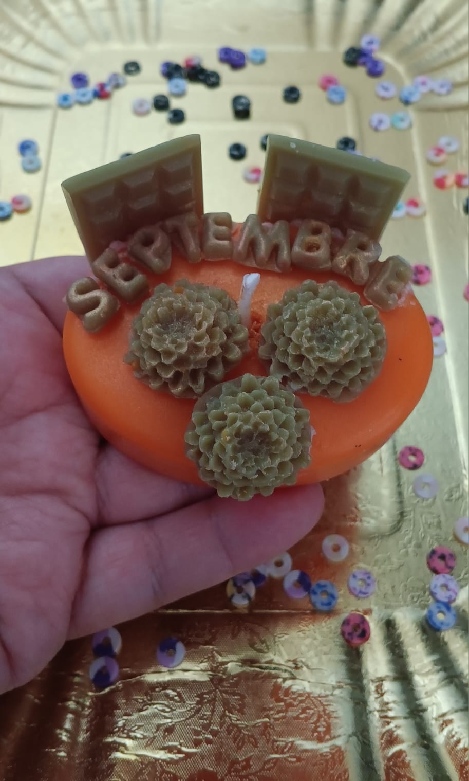 Bougie septembre orange senteur noix de coco